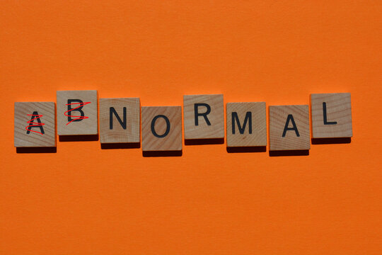 Abnormal, Word With Ab Crossed Out, Leaving The Word Normal.