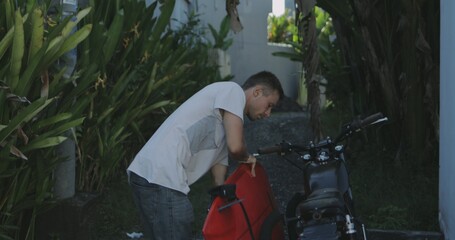 Motorcyclist driving his motorbike