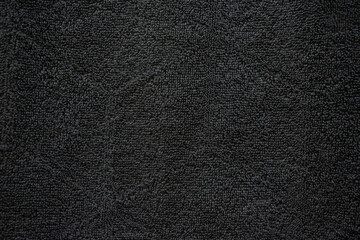Fototapeta na wymiar black fabric texture towel blanket