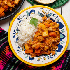 Mexican picadillo with rice on white background