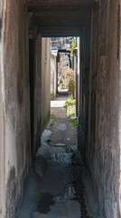 Tongli, JIangsu, China - May 3, 2010: Hutong network of narrow walkways, simple housing, and small...