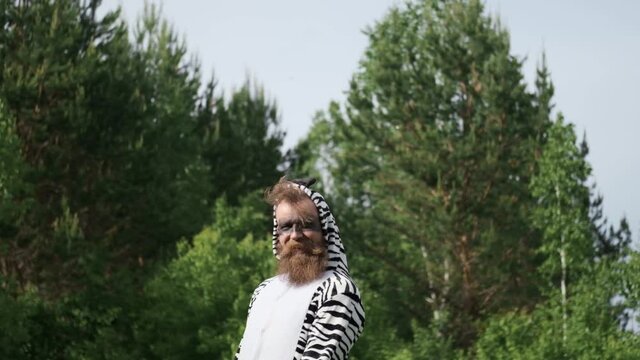 Crazy people, man in a Zebra costume, bright emotion,kigurumi, funny moment, facial expressions, antics, good mood