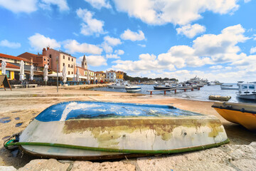 Marina and Campanile of the picturesque Fazana on Istria peninsula in Croatia. In foreground a old boat.