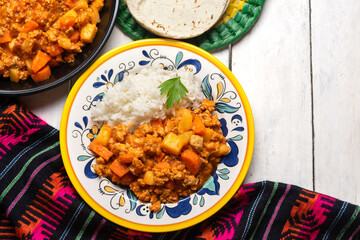 Mexican picadillo with rice on white background