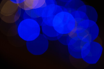 Background lights in defocus of different colors.