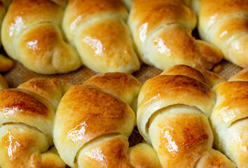 Argentine croissants, medialunas de Manteca over silicon pastry mat