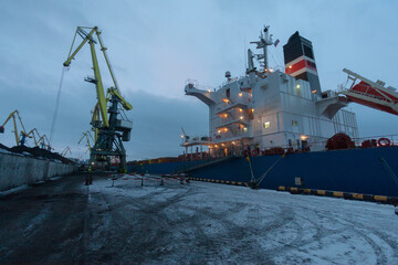 General view of the cargo port. Freight railroad cars await unloading near the coal terminal....