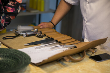 kitchen tools of a professional chef in a leather case