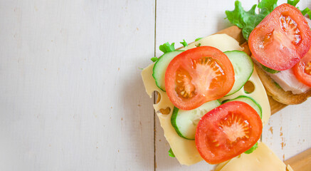 Toasts with cheese and tomatoes and greens. Healthy eating concept. Banner. copyspace.