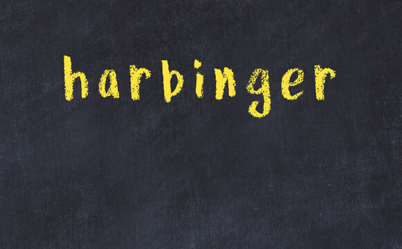 Black chalkboard with inscription harbinger on in