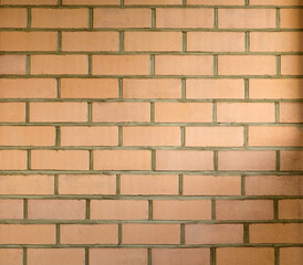 Orange brick wall of bricks