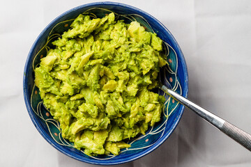 Guacamole in a blue bowl