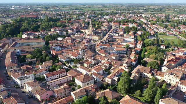 Picturesque aerial view of Portogruaro cityscape in sunny summer day, Italy