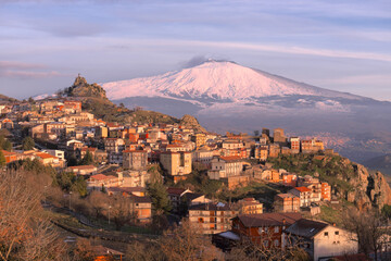Obraz premium Mountain Village Of Sicily And Natural Landmark Etna Snow Covered