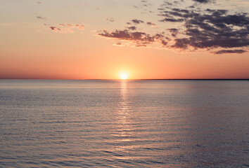 Sunset over the ocean, beautiful clouds