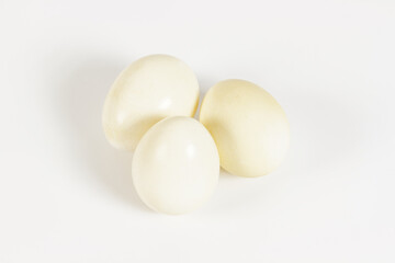 Three white eggs isolated on white background