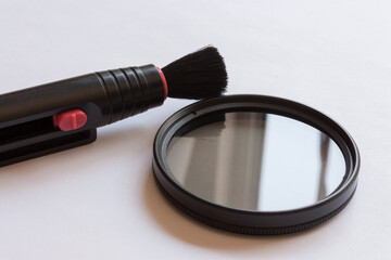 Cleaning brush for cameras and lenses