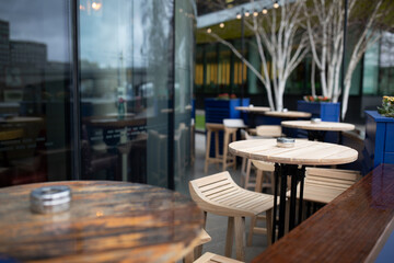 outdoor empty terraces in london, empty tables due to coronavirus panic. deserted terrace due to quarantine