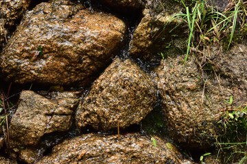 Image of Water flowing through rocks
