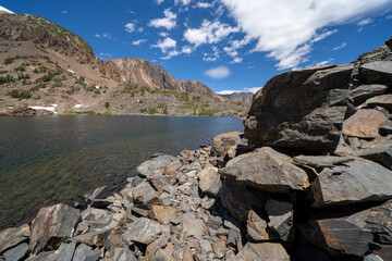 Large rocks and loose scree along Lake Helen along the 20 Lakes Basin and Lundy Canyon in California Mono County