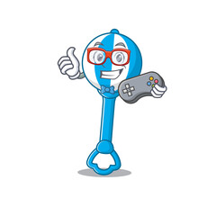 Mascot design style of rattle toy gamer playing with controller