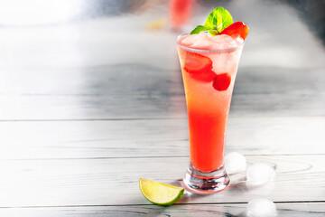 lemonade strawberry in glass on table with place for text.