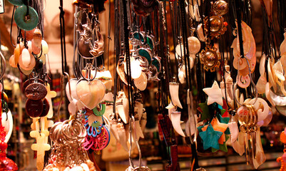 Colorful craft jewelry providing interesting background image.