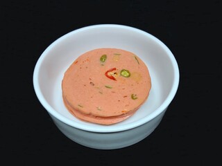 Spicy Chili Bologna on White Bowl with Black Background. 