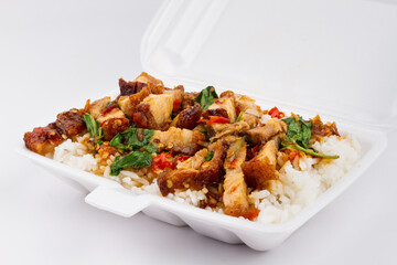 Rice and Pork fried with holy basil on white background, Thai style food,