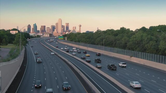 Aerial Flying Over Freeway Traffic On Interstate 35 Looking To Downtown Dallas. Texas, USA