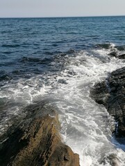 waves crashing on rocks