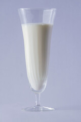 cup of cold milk on white background.