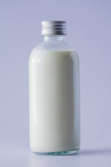 cup of cold milk on white background.