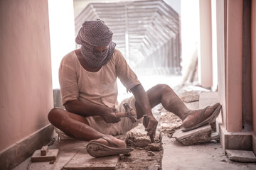  jaipur. Rajasthan. India - may 21, 2020 Asia people work hard about construction in factory with...