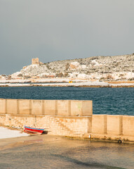 Ionian coast after a exceptional snowfall, Salento, Italy