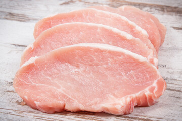 Raw meat pork steaks containing protein for lunch or dinner