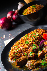 Buckwheat groats baked in the oven with beef goulash