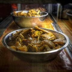 pieces of fried chicken on a stainless-steel basin