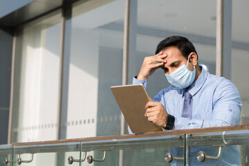 Businessman worried about loss due to impact of pandemic coronavirus