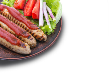 grilled fried sausages with salad on a plate isolate on white