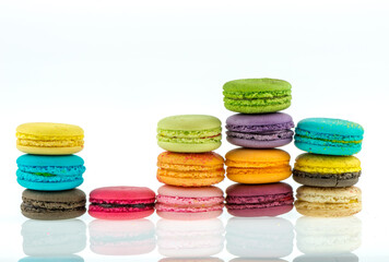 Colorful macarons on white background. Macaron or Macaroon is sweet meringue-based confection.