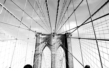 Black & White image of Brooklyn Bridge seen through cables