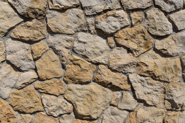 Decorative wall of wild stone. texture