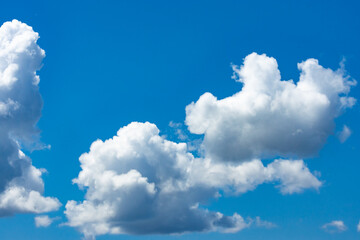 Naklejka na ściany i meble Bright blue summer clear sky. Aerial background