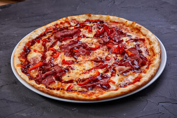 pizza with bacon, salami and mozzarella