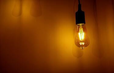 focused yellow light glass bulb with fixture and gradient light