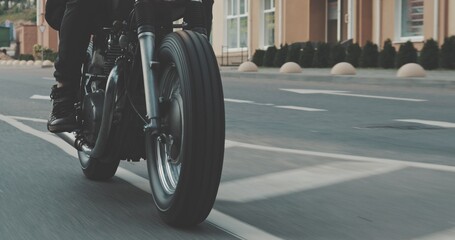 Biker riding on motorcycle in city