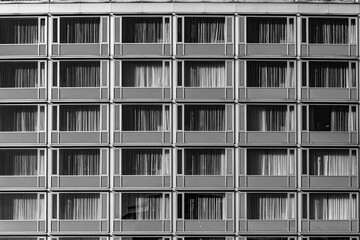 windows of office building in vintage style with curtain
