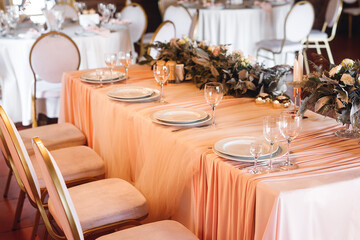 Presidium table setting with empty wine glasses