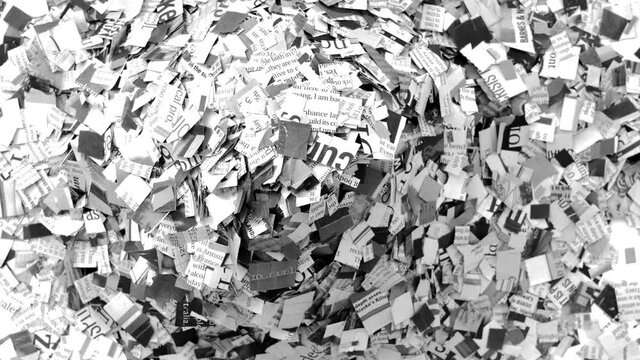 A a big pile of cut up Newspaper transition